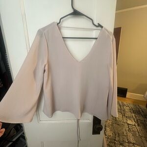 Elegant Women's V-Neck Top in Cream